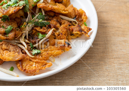 Crispy fried mussel pancake with egg Crispy fried mussel pancake with egg 103305560