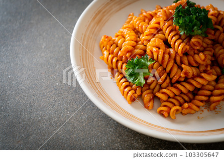 spirali or spiral pasta with tomato sauce spirali or spiral pasta with tomato sauce 103305647