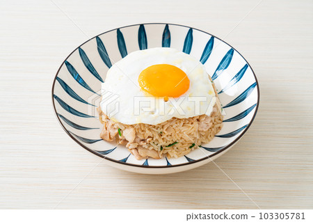 fried rice with pork and fried egg in Japanese style fried rice with pork and fried egg in Japanese style 103305781