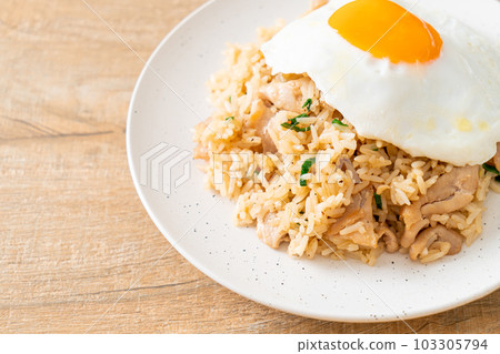 fried rice with pork and fried egg in Japanese style 103305794