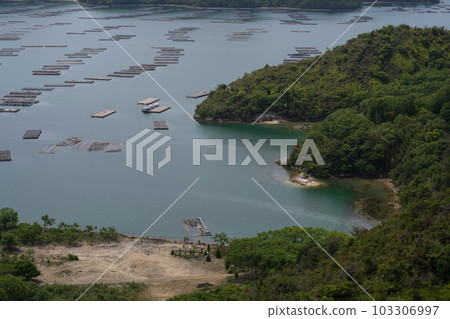Beautiful sea with oyster farming rafts in Setouchi City, Okayama Prefecture, Japan Beautiful sea with oyster farming rafts in Setouchi City, Okayama Prefecture, Japan 103306997