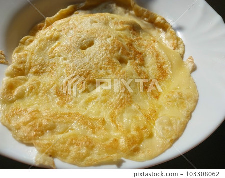 Pancakes fried in a pan 103308062