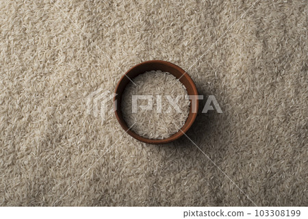 Rice and clay bowl background with copy-space 103308199