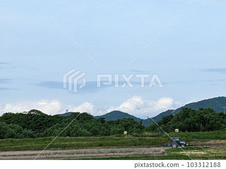 Tractor and countryside 103312188