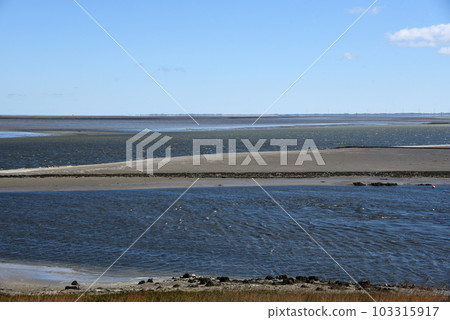 Den Helder, Netherlands. May 2023. The Wadden Sea near Den Helder, North Holland. Den Helder, Netherlands. May 2023. The Wadden Sea near Den Helder, North Holland. 103315917