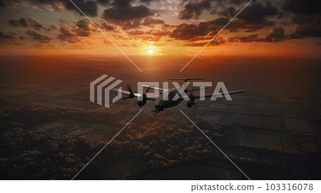 View from above. Photo of an Military drone in flight observing positions on the rays of the setting sun 103316078