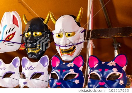 Hannya mask sold at a festival stall in Shinjuku Ward, Tokyo 103317933