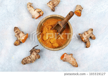Turmeric root and turmeric powder. Turmeric root and turmeric powder. 103319127