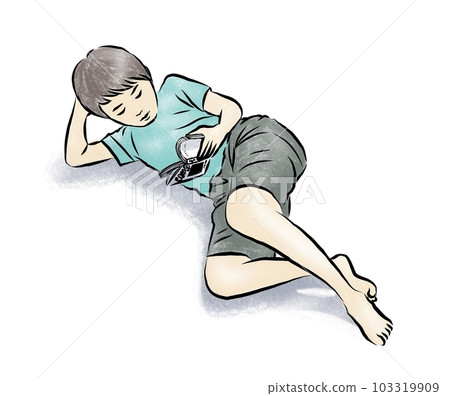A boy lying down and reading a manga A boy lying down and reading a manga 103319909