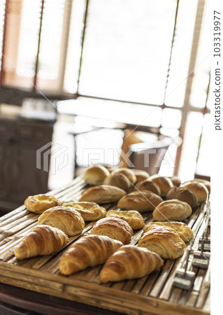 selection of pastries and bread on display in french cafe buffet 103319977