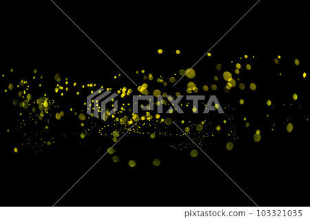 Yellow light bokeh of Firefly lightning bug on black background 103321035
