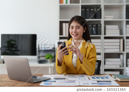 Beautiful Businesswoman completes KYC using an online banking program in order to open a digital savings account. The definition of cyber security 103321365