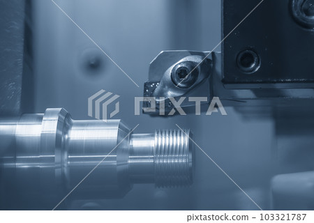 The CNC lathe machine thread cutting at the end of metal stud parts. The CNC lathe machine thread cutting at the end of metal stud parts. 103321787