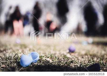 Open and discarded halves of plastic Easter eggs after a public hunt.  103322018