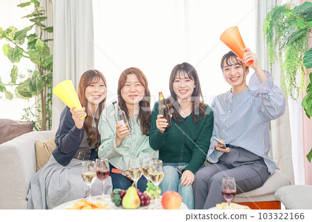 Four women watching sports Four women watching sports 103322166