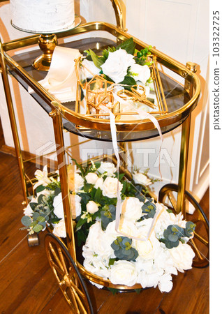 Scissors for cutting gold rings and ribbons of betrothed couples, engagement ceremony in Turkey 103322725