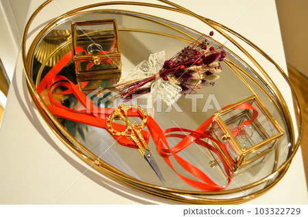 Scissors for cutting gold rings and ribbons of betrothed couples, engagement ceremony in Turkey Scissors for cutting gold rings and ribbons of betrothed couples, engagement ceremony in Turkey 103322729