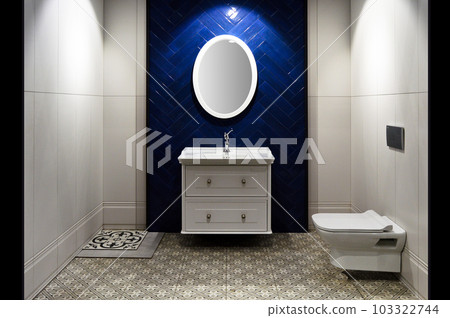 Modern luxury bathroom white sink and cabinet design, blue wall ceramics Modern luxury bathroom white sink and cabinet design, blue wall ceramics 103322744
