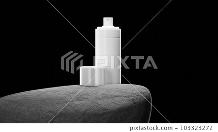 Bottle with sprey on big grey stone. Bottle with sprey on big grey stone. 103323272