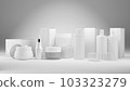 Jars, bottles and tubes for cosmetics on a grey background. 103323279