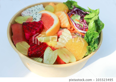 fruit and vegetable salad or orange, dragon fruit and lettuce salad fruit and vegetable salad or orange, dragon fruit and lettuce salad 103323495
