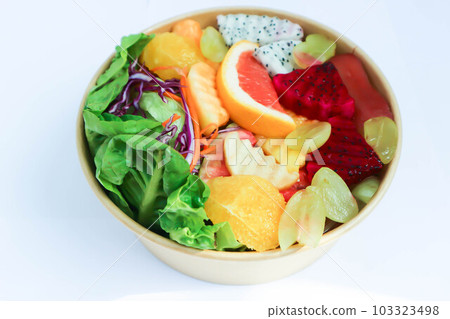 fruit and vegetable salad or orange, dragon fruit and lettuce salad fruit and vegetable salad or orange, dragon fruit and lettuce salad 103323498