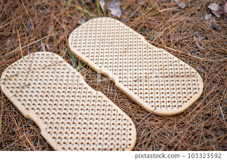 Sadhu board The practice of standing on nails. Yoga concept. Sadhu board The practice of standing on nails. Yoga concept. 103323592