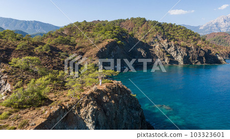 View of Olympos - Chiraly beach and Mediterranean Sea on sunny summer day. Turkey. View of Olympos - Chiraly beach and Mediterranean Sea on sunny summer day. Turkey. 103323601