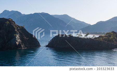 View of Olympos - Chiraly beach and Mediterranean Sea on sunny summer day. Turkey. View of Olympos - Chiraly beach and Mediterranean Sea on sunny summer day. Turkey. 103323633
