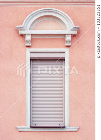 plastic windows on the vintage wall. traditional old european architecture plastic windows on the vintage wall. traditional old european architecture 103323851