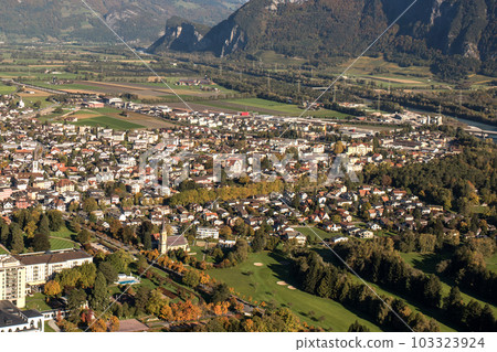 Panorama of the city of Bad Ragaz against the background of the Swiss Alps at sunset. Bad Ragaz Switzerland. Aerial view. Top view 103323924