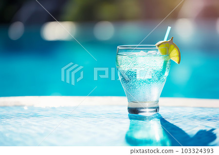 Tropical cocktail on poolside by pool. Generative AI illustration 103324393
