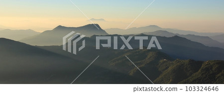 Green hills and valleys seen from Ghale Gaun at sunrise. Annapurna Conservartion Area, Nepal. 103324646
