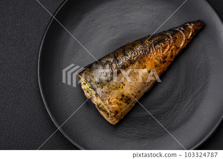 Delicious grilled ocean mackerel with salt, spices and herbs Delicious grilled ocean mackerel with salt, spices and herbs 103324787