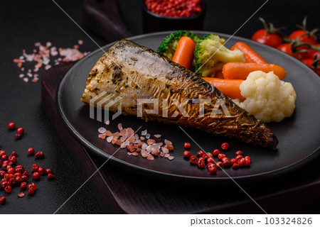 Delicious grilled ocean mackerel with salt, spices and herbs Delicious grilled ocean mackerel with salt, spices and herbs 103324826
