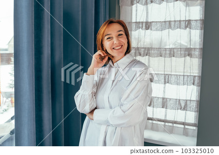 Middle age brunette business woman. Beautiful serious business woman. Middle age brunette business woman. Beautiful serious business woman. 103325010