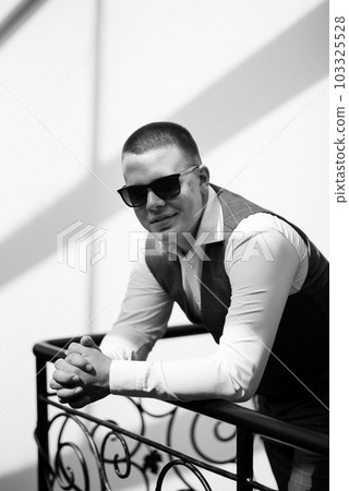 portrait of the groom of a man in the morning before the wedding portrait of the groom of a man in the morning before the wedding 103325528