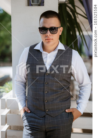 portrait of the groom of a man in the morning before the wedding 103325584