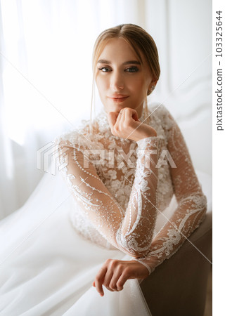 portrait of a bride in the morning before the wedding 103325644