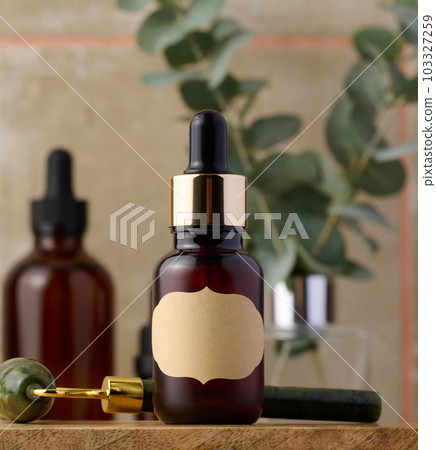 Glass bottle with pipette, packaging for cosmetics, advertising and promotion 103327259