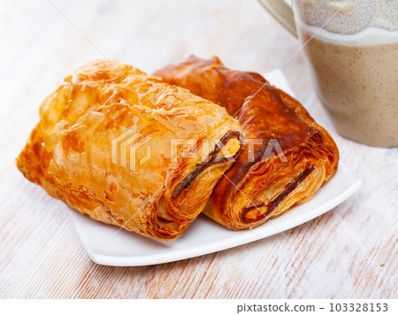 Napolitana with meat and cheese, spanish pastry 103328153