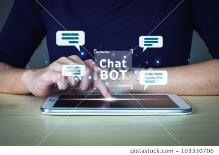 Businessman touching tablet with virtual of graphic of Artificial Intelligence AI, and a futuristic business technology development, IoT, innovative. Businessman touching tablet with virtual of graphic of Artificial Intelligence AI, and a futuristic business technology development, IoT, innovative. 103330706