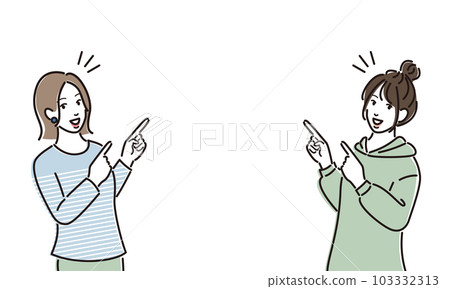 Two young women pointing and guiding 103332313