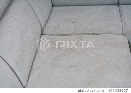 Dirty, stain, blot, fleck of water on the fabric, textile sofa. Dirty textile sofa chemical cleaning Dirty, stain, blot, fleck of water on the fabric, textile sofa. Dirty textile sofa chemical cleaning 103333367