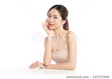 Beautiful young asian woman with clean fresh skin on white background, Face care, Facial treatment, Cosmetology, beauty and spa, Asian women portrait. Beautiful young asian woman with clean fresh skin on white background, Face care, Facial treatment, Cosmetology, beauty and spa, Asian women portrait. 103335044
