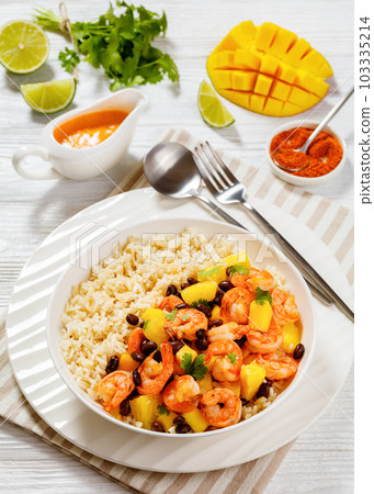 shrimps with beans, mango, brown rice in bowl shrimps with beans, mango, brown rice in bowl 103335214