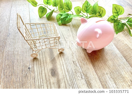 Pig piggy bank and cart Saving money for shopping Pig piggy bank and cart Saving money for shopping 103335771