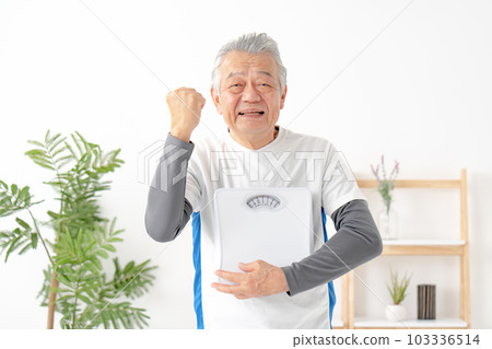 A man holding a weight scale, dieting, guts pose 103336514