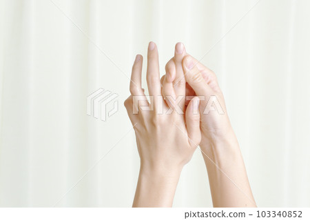 A woman doing hand care 103340852