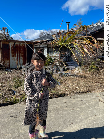 happy girl holding a leaf happy girl holding a leaf 103340931